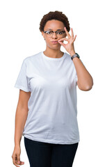Beautiful young african american woman wearing glasses over isolated background mouth and lips shut...