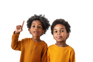 Two african kids pointing upwards with a finger. Back to school concept. Transparent background