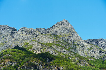Fototapeta premium Mountain top from Gudvangen by the Naeroeyfjorden Fjord, Norway.