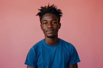 Fototapeta premium Portrait of Young Man on Pink Background