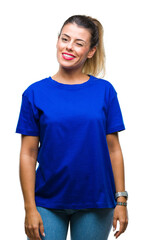 Young beautiful woman wearing casual blue t-shirt over isolated background winking looking at the camera with sexy expression, cheerful and happy face.