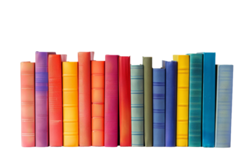 A row of colorful books lined up on a white background