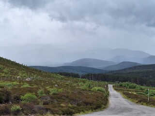 Road to mountains in the distance, Cairngorms, Scotland