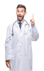 Young handsome doctor man over isolated background pointing finger up with successful idea. Exited and happy. Number one.