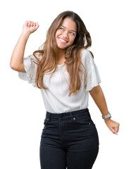 Young beautiful brunette business woman over isolated background Dancing happy and cheerful, smiling moving casual and confident listening to music