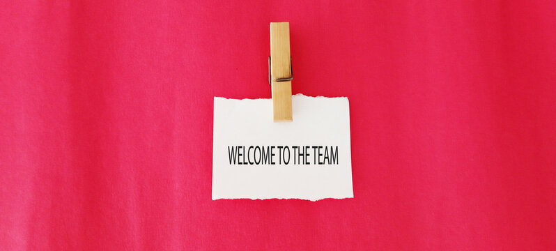 Welcome to the team symbol. Concept words Welcome to the team on beautiful white paper. Beautiful yellow paper background. Business, motivational and welcome to the team concept.