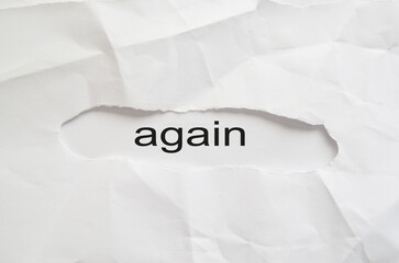 Begin again symbol. Businessman turns wooden cubes and changes the word begin to again. Beautiful grey table, grey background. Business and begin again concept. Copy space.