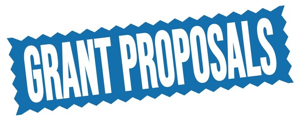 GRANT PROPOSALS text written on blue stamp sign.