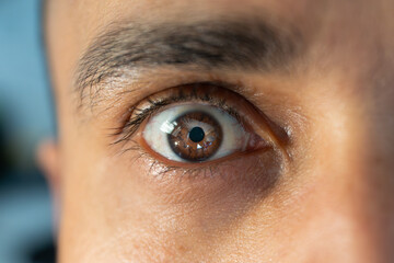 Close up view of a male eye.