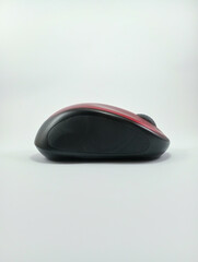 Sleek black and red colored computer mouse, placed against a crisp white background, highlighting its ergonomic design and vibrant color contrast for a modern and dynamic tech accessory