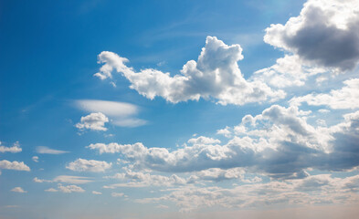 Bright blue sky with clouds