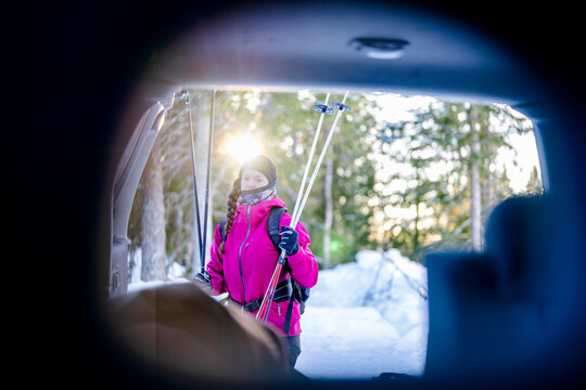 Mid adult Woman holding Ski pole in winter