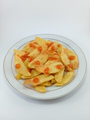 Thin Sliced Potato Fries with Ketchup Sprinkles on White Plate and Background: Crispy and Flavorful Snack, Enhanced with Savory Ketchup, Perfectly Presented for Enjoyment in a Comfortable Dining