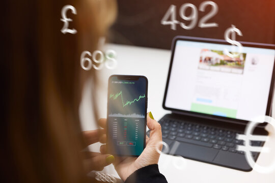 Digitally generated image of businesswoman analyzing chart in phone while working in office
