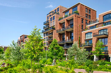 Rotterdam, The Netherlands, June 6, 2024: new Little C residential neighbourhood with equally new Tuschinski Park in the foreground