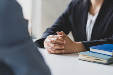 Job searching, Applicants submit application documents and resumes during job interviews in the office. Job interview