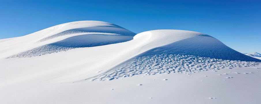 Discover the pristine beauty of a snow-covered mountain range, offering breathtaking views and a tranquil environment for outdoor recreation Explore unspoiled landscapes, perfect for hiking,