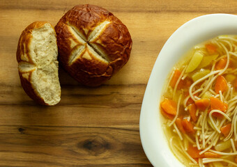 vegetable soup with carrots and potatoes, Bavarian bun