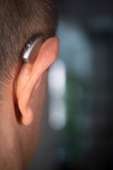 Hearing aid ear of man