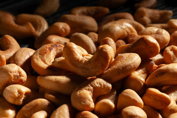 cashew nuts on black background