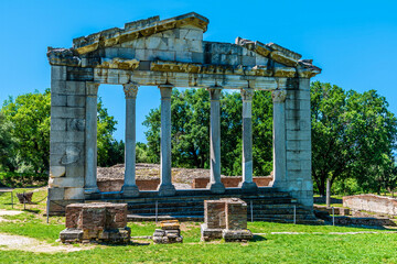 A view towards the council meeting building in the Roman ruins of Apollonia in Albania in summertime
