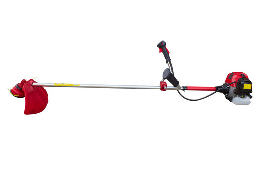 brush cutter on a white background, new red brush cutter for cutting grass and weeds