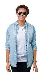 Beautiful young african american woman wearing sunglasses over isolated background with a happy and cool smile on face. Lucky person.