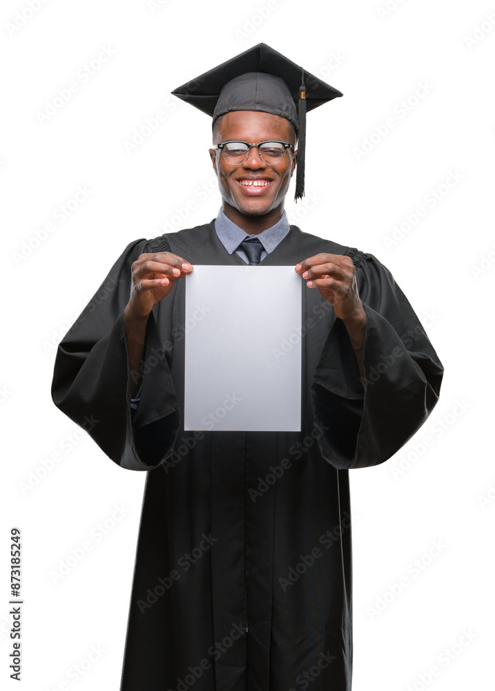 Wall mural Young graduated african american man holding blank paper degree over isolated background with a happy face standing and smiling with a confident smile showing teeth