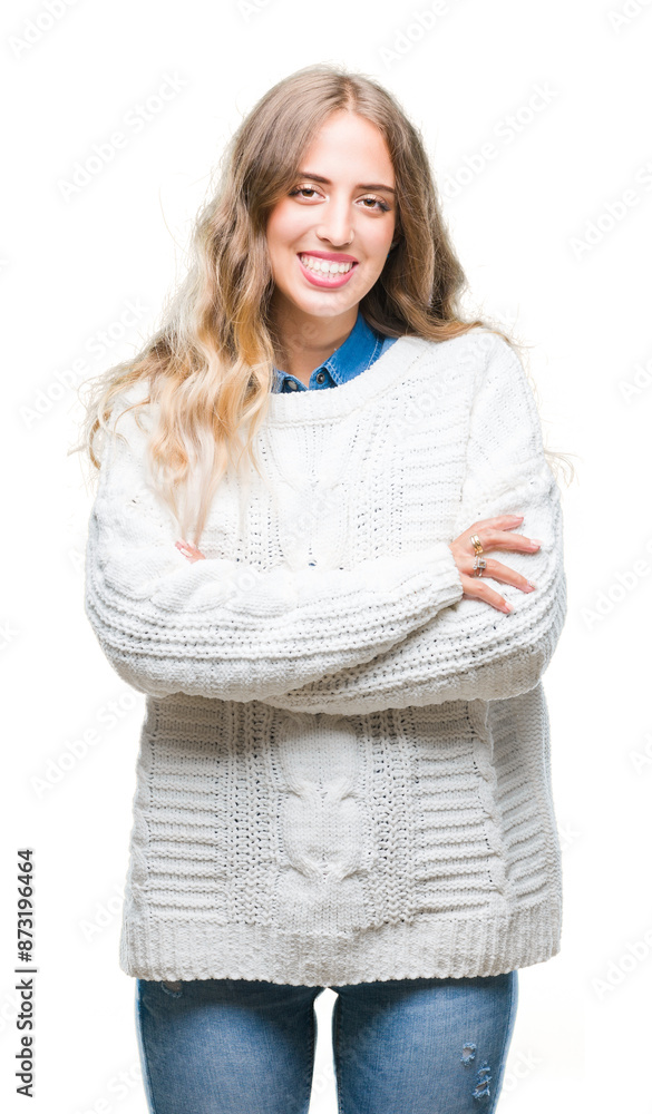 Sticker Beautiful young blonde woman wearing winter sweater over isolated background happy face smiling with crossed arms looking at the camera. Positive person.