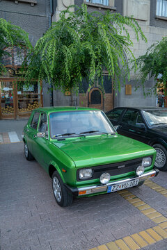 Restored 1985 Zastava 101 (Yugo Skala 55) licensed Yugoslavian FIAT 128 is parked at Subotica, Serbia  29.06.2024 - vertical image
