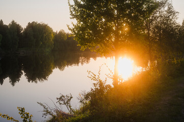 Obraz premium Summer sunset over the river. Finland