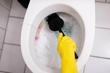 The process of washing a toilet with a cleaning product, cleaning toilets