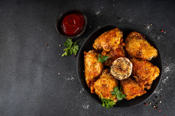 Grilled roasted spicy chicken thigh with ketchup