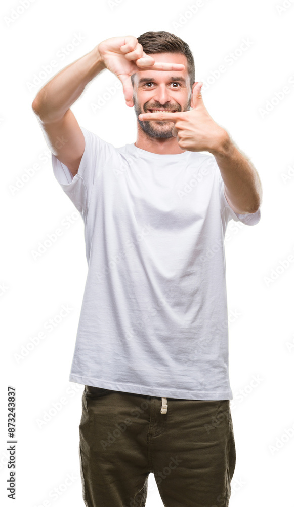 Canvas Prints young handsome man over isolated background smiling making frame with hands and fingers with happy f