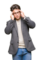 Young business man wearing glasses over isolated background with hand on head for pain in head because stress. Suffering migraine.
