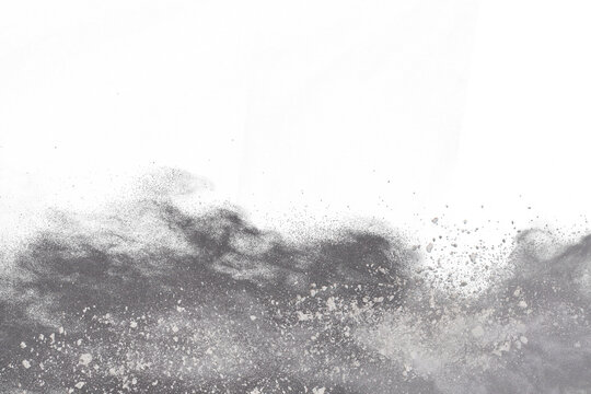 White powder explosion on black background. Colored cloud. Colorful dust explode. Paint Holi.