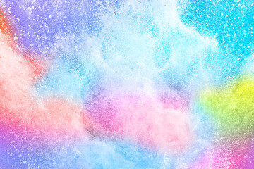 Colorful powder explosion on white background. Colorful dust cloud.