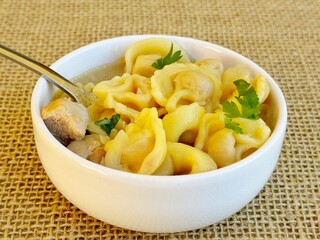 Soup. Italian tortellini soup (capeletti, agnolini) with chicken and vegetables. Special meal, starter or nutritious side dish or for a cold winter day.