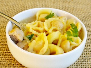 Soup. Italian tortellini soup (capeletti, agnolini) with chicken and vegetables. Special meal, starter or nutritious side dish or for a cold winter day.