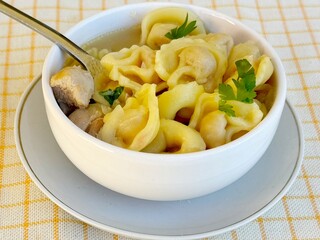 Soup. Italian tortellini soup (capeletti, agnolini) with chicken and vegetables. Special meal, starter or nutritious side dish or for a cold winter day.