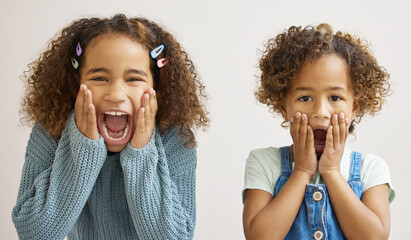 Boy, girl and children in studio with shock or surprise, wow hands for omg emoji or excited scream. Kids, white background and portrait with open mouth for crazy shout, amazing news or announcement