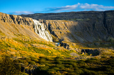 Obraz premium Landscape with waterfall in the mountains of Iceland