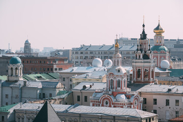 Top view of Moscow, the roofs of the city and the domes of Orthodox churches