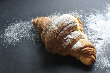 croissant on wooden background