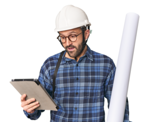 Hispanic male architect with blueprint and tablet in studio