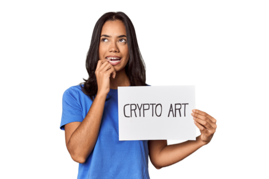 Woman with "crypto art" sign in studio relaxed thinking about something looking at a copy space.