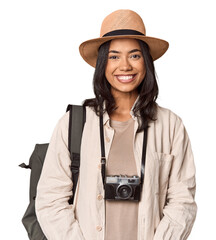 Traveling Filipino young woman with vintage camera