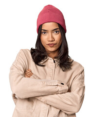 Thoughtful young Filipino woman in studio