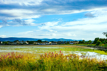 Dublin, Ireland - wetland beach under blue sky and white clouds