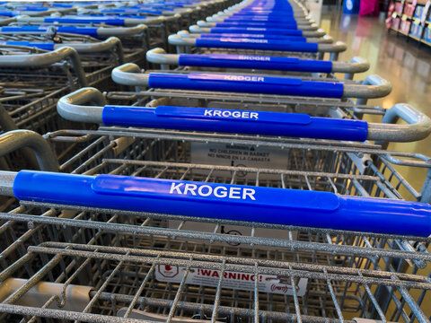 AUGUSTA, GEORGIA - JULY 4, 2024 : Kroger Marketplace grocery store shopping carts. Kroger is an American supermarket chain that was founded by Bernard Kroger in 1883.